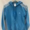 Sudadera con capucha y cremallera azul de Adidas talla S